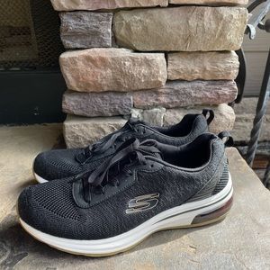 Skechers Women’s black sneakers size 8